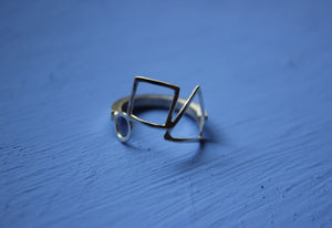 Square band open shapes ring