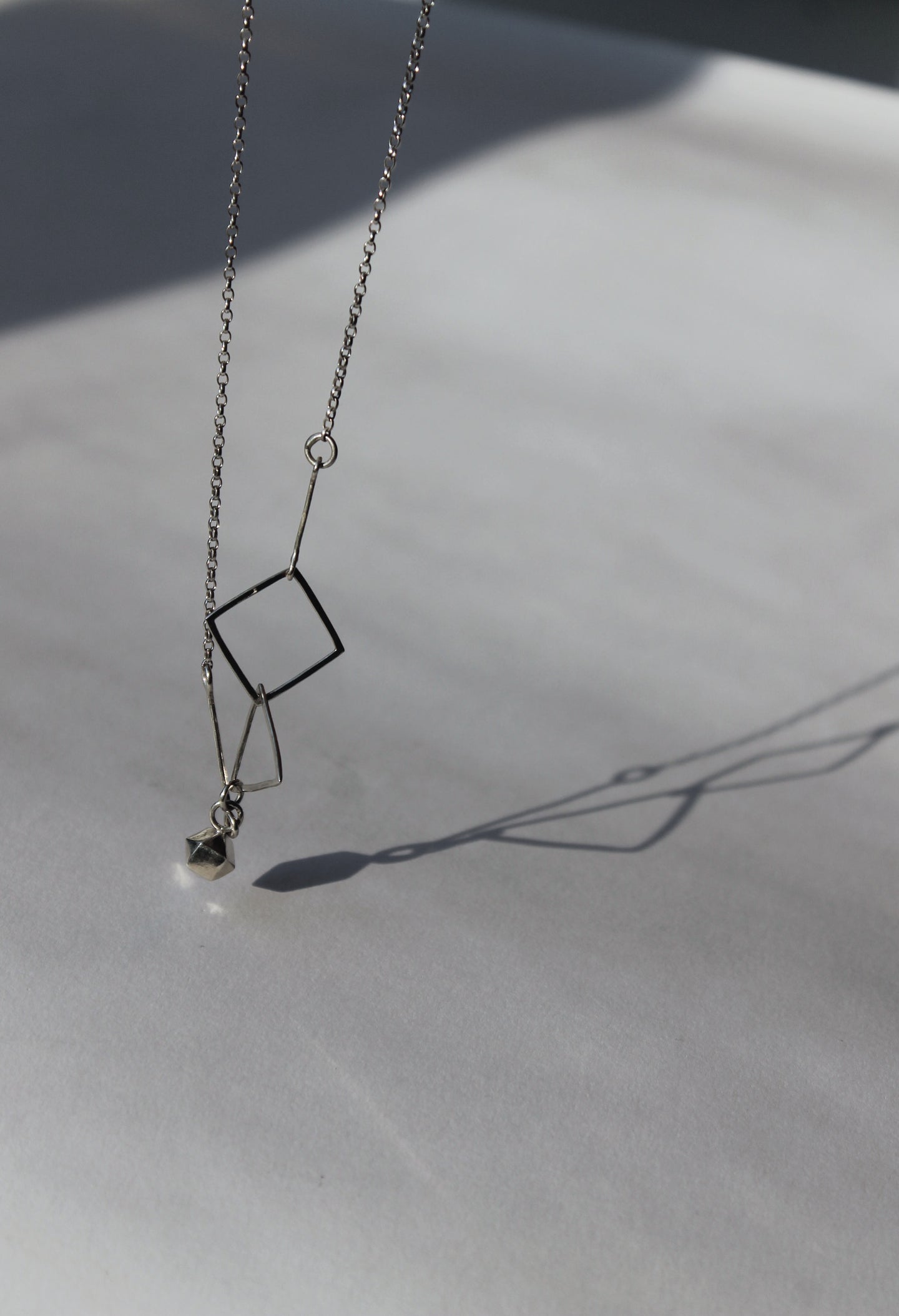 Cuboctahedron slant necklace